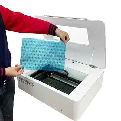 Niestandardowe mobilne naklejki laserowe do cięcia skóry papierowej Ocieplenie wodne Weihong Control Automatic Laser Cutting Plotter